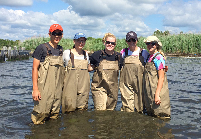 Students in their waders at Drexel's Environmental Science Leadership Academy 2015